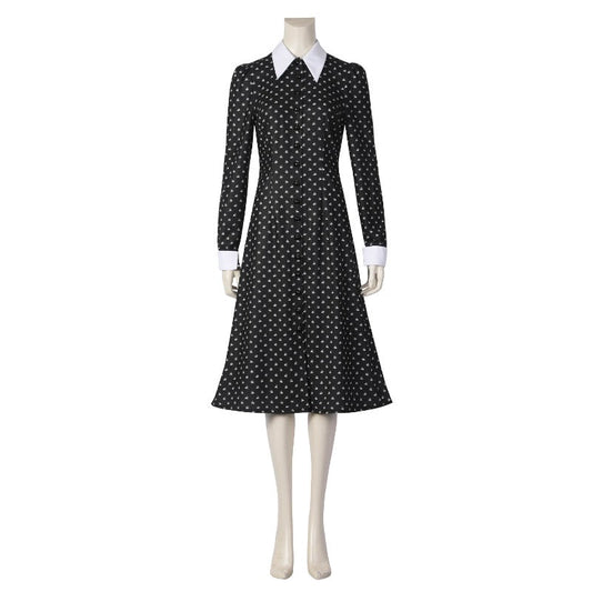 The Addams Family LEGO set and cosplay costumes displayed together